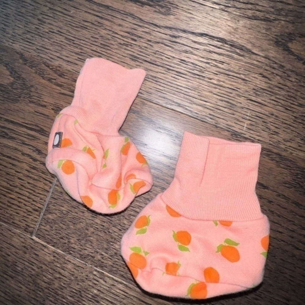 Pink baby booties with oranges !!